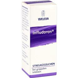 Weiße Verpackung mit lila Aufschrift "Infludoron" und "Streukügelchen bei grippalen Infekten".